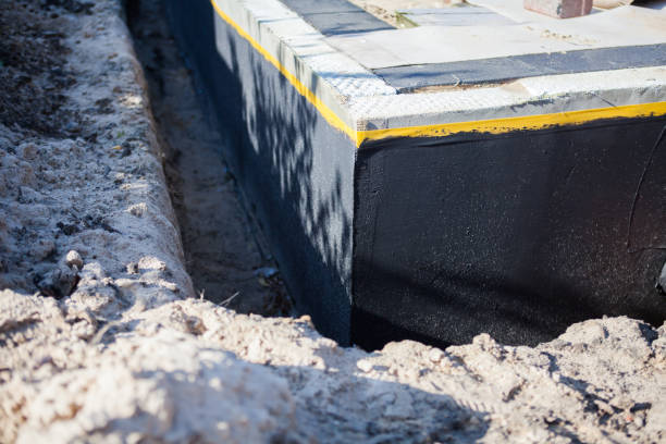 Professional Wet Basement Repair technician working in Warsaw, IN